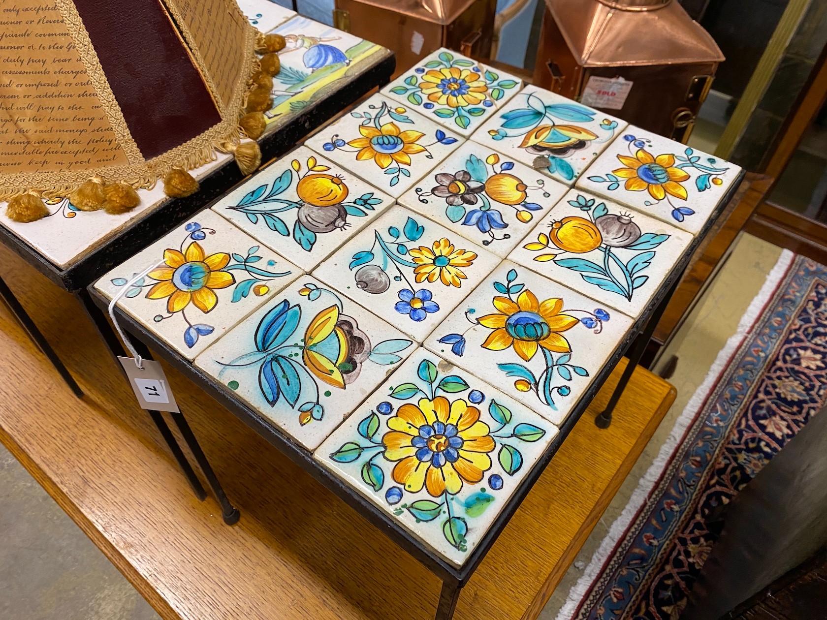 A set of four mid century rectangular tile top occasional tables, largest length 45cm, depth 34cm, height 46cm